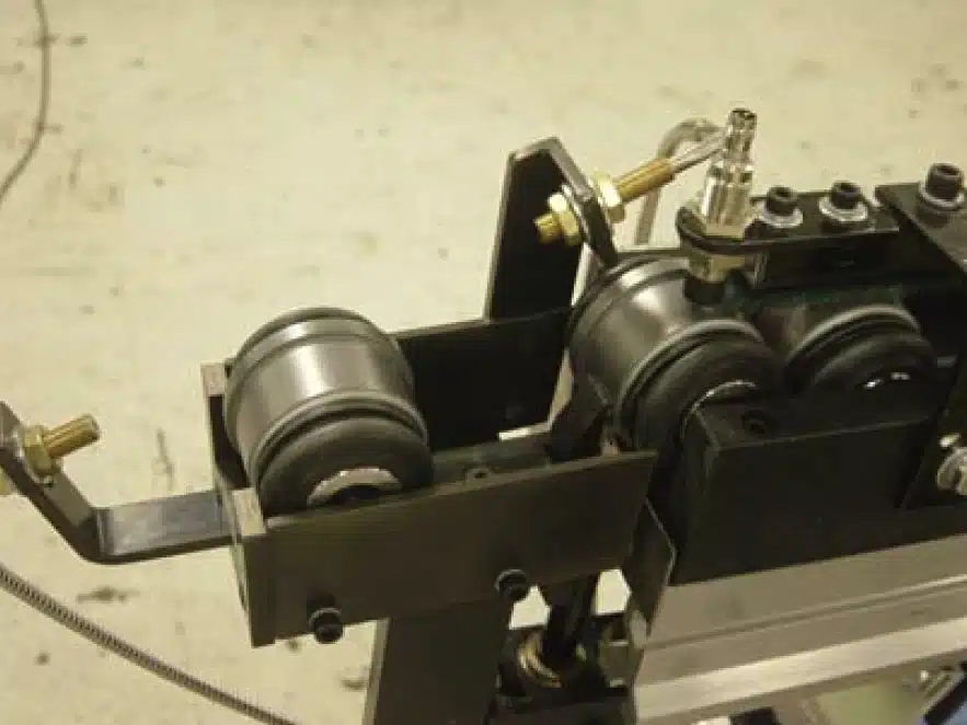 Linear Discharge w/ Singulation Escapement w/ dead nest for robot integration